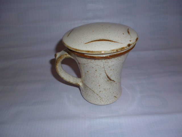 Green tea mug with tea stanier