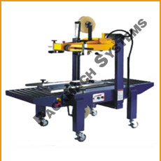 Carton strapping machine