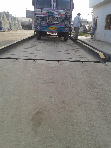 Metal Pitless Type Weighbridge, for Loading Heavy Vehicles, Feature : Durable, Non Breakable