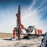Surface top hammer drill rigs
