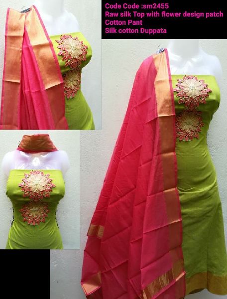 raw silk suits with net designer dupatta