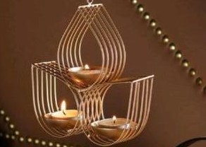 brass finish hanging diyas by Max International, brass finish hanging ...