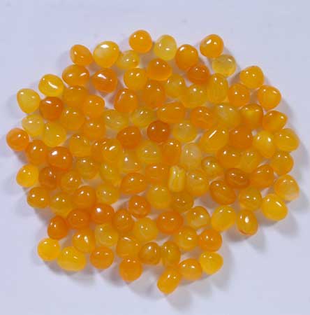 Yellow Onyx Tumbled Stones - Natural Trading Co., Anand, Gujarat