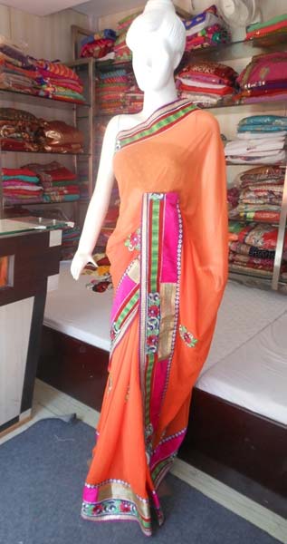 Designer Embroided Rasem with Zari Work Orange Colour Saree