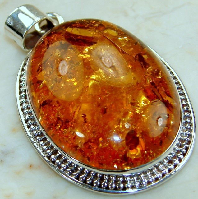 Silver amber pendant, Occasion : Daily Wear, Party Wear