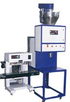 Augur Filling Machine with continous band sealer
