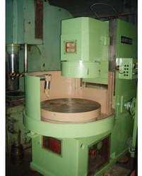Rotary grinding machine