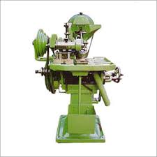 Screw head slotting machine