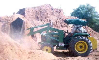 Tractor Mounted Biocoad Loader