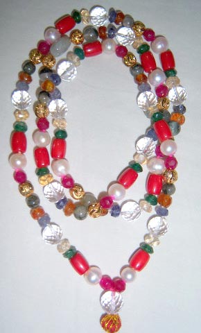 Oval Polished Gemstone Navratna Mala, for Jewellery, Style : Fashionable