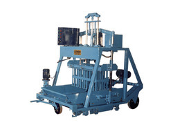 Concrete brick making machine