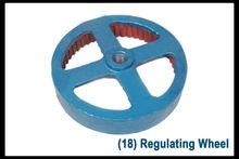 Regulating wheel for grinding mill