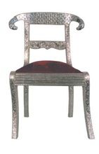 white metal ram head chair