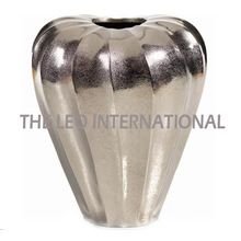 Raw finish silver plated metal vase