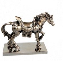 NICKLE PLATED WALKIING HORSE STATUE