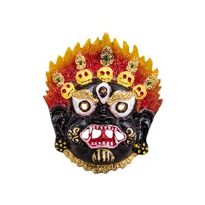 metallic multi color evil face wall hanging