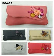 Embossed evening clutch bags