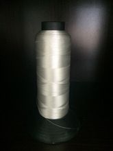 white spun polyester sewing thread