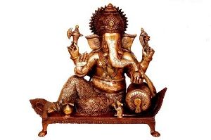Lord Ganesha Sitting On A Sofa Brass Metal Statue of modern sculpture