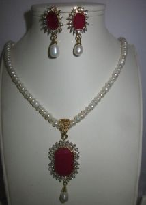 1 row pearl mala with red pendent