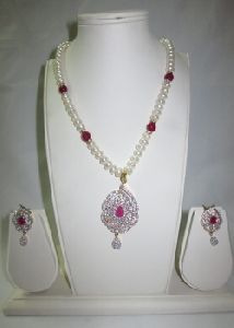 Red stone pendent with pearl mala