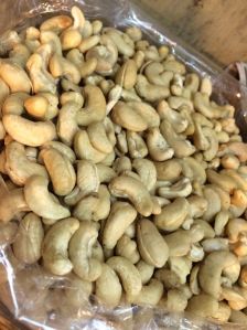Roasted Cashew Nuts, Shape : Curve, Packaging Type : Light Cream