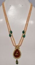 latest design natural pear shape onyx kundan polki with emerald drop pendant