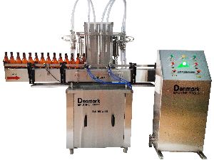 automatic volumetric liquid bottle filling