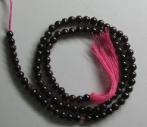 Garnet plain round beads