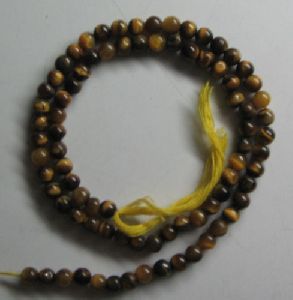Yellow tiger eye plain round beads