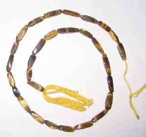 Yellow tiger eye twisted gem beads