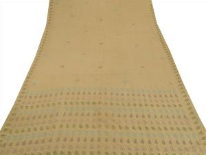 cream colored hand embroidered pure georgette silk sari