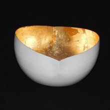 Golden and white candle votive