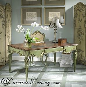 CARVINGS SIGNATURE COLLECTION TABLE