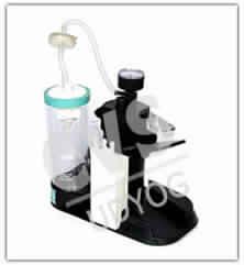 Portable foot operated suction unit