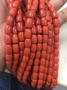 Coral glass beads