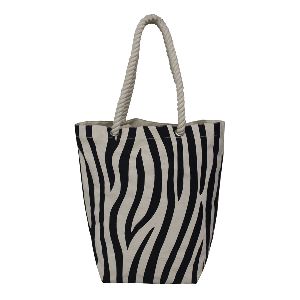 over all zebra print twisted rope handle canvas tote bag