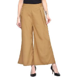 How to Wear Culottes Palazzo Pants Gauchos  Glamour