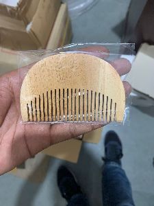 pocket size neem wood beard comb