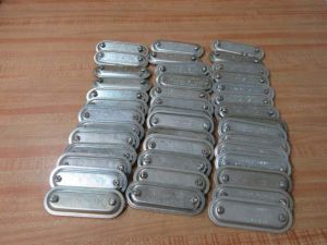 Aluminum stamped cover for conduit body