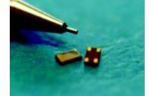 SURFACE MOUNT MONOLITHIC CRYSTAL FILTER