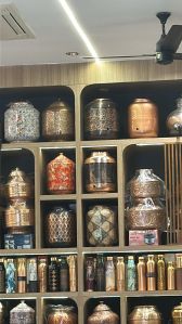 copper matka and bottles