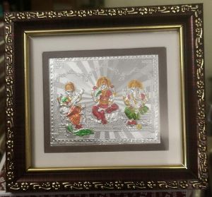 999 Silver Gods Ganesh Laxmi Saraswati ji Photo Brown Frames Momento with Natural Fragrance.