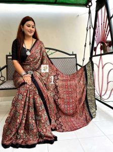 Hand Block Printed Ajrakh on Modal Silk sarees with Tissue Pallu