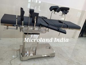 C-arm fully electric operated surgical table with remote & battery backup.