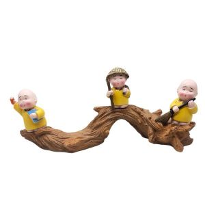3 Little Monk On Wooden Platform