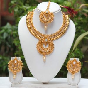 Designer Polished Metal Imitation Necklace Set, Color : Golden Wedding Wear, Packaging Type : Box