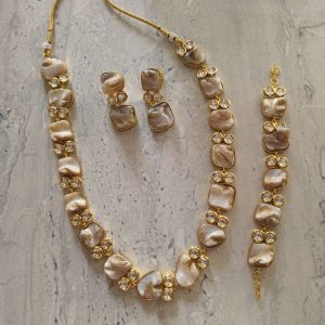 motherpearl kundan necklace earrings bracelet set