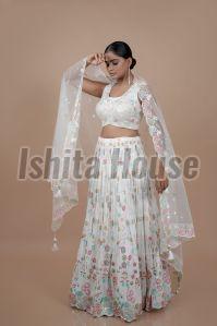 Ladies White Embroidery Work Lehenga Choli, Technics : Machine Made