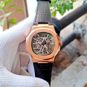Patek Philippe Nautilus Rose Gold Green Dial Black Leather Strap Watch